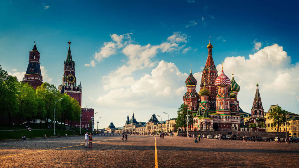 Vibrant Kremlin and Saint Basil’s Cathedral Moscow Red Square historic colorful architecture wallpaper