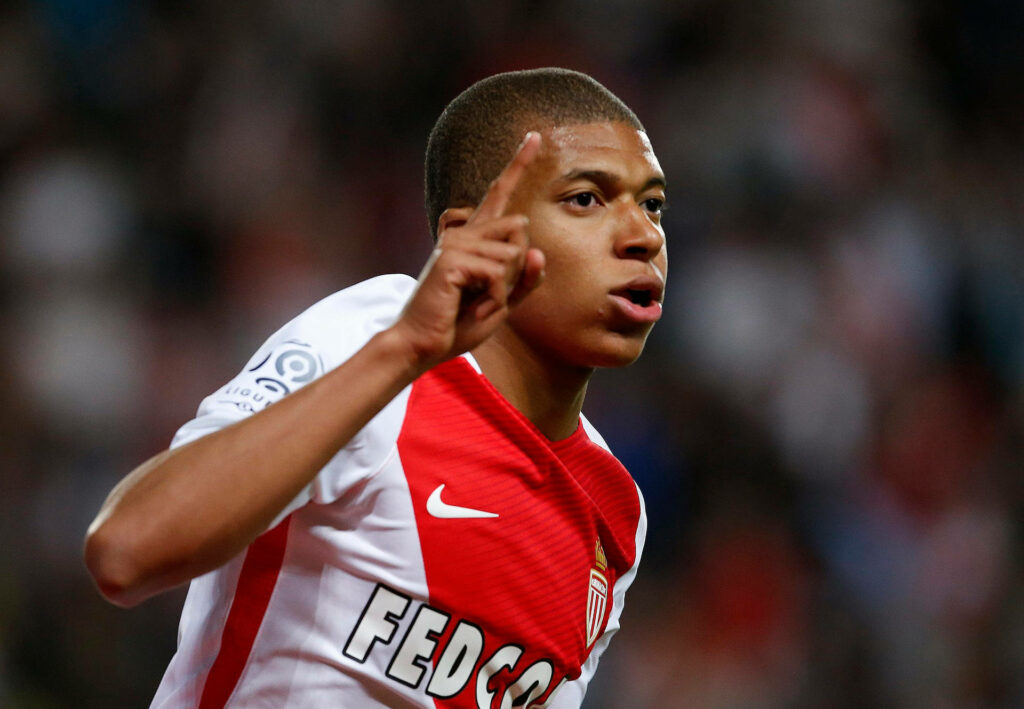 Vibrant AS Monaco Wallpaper: Kylian Mbappe in Action