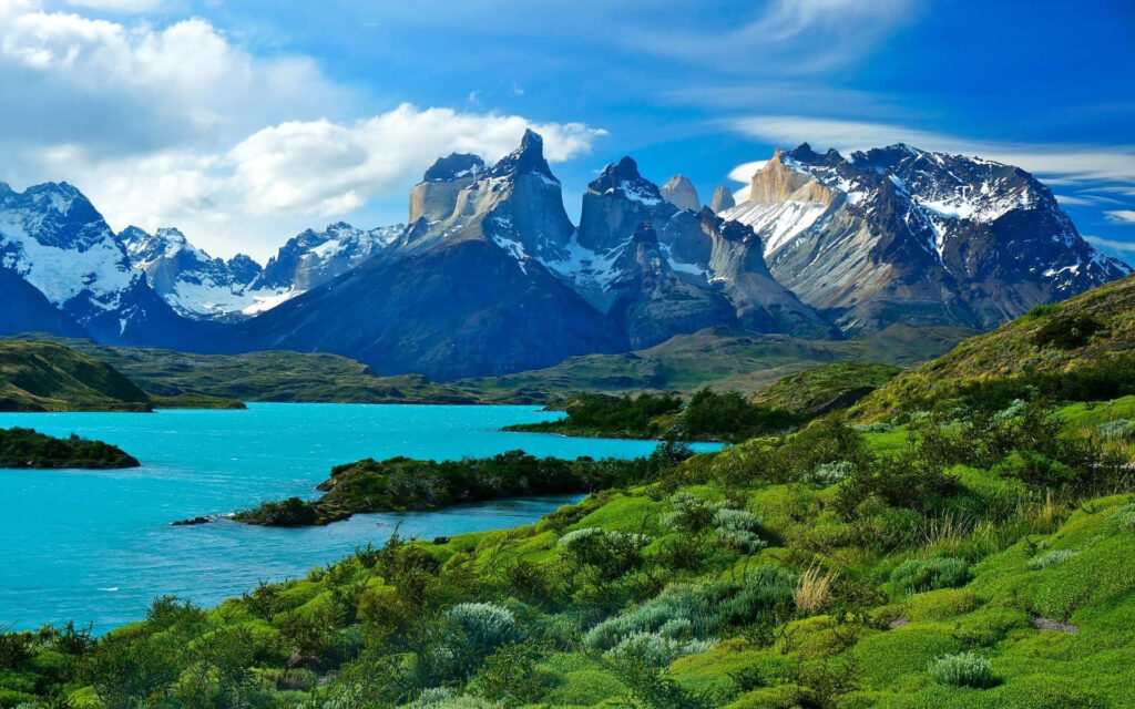 Vibrant Landscape Wallpaper: Turquoise River & Snow-Capped Mountains