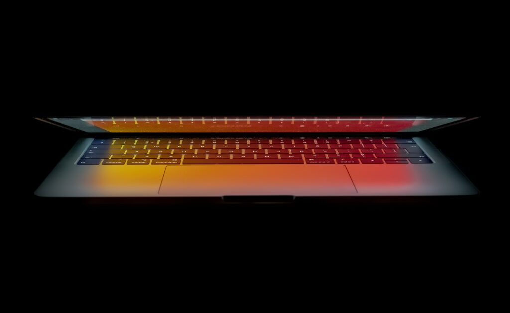 Vibrant Laptop Wallpaper: Sleek Design with Bold Backlighting