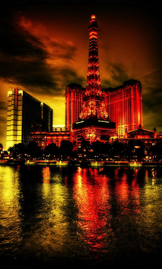 Vibrant Las Vegas Night Wallpaper: Eiffel Tower Reflection & Red Hues