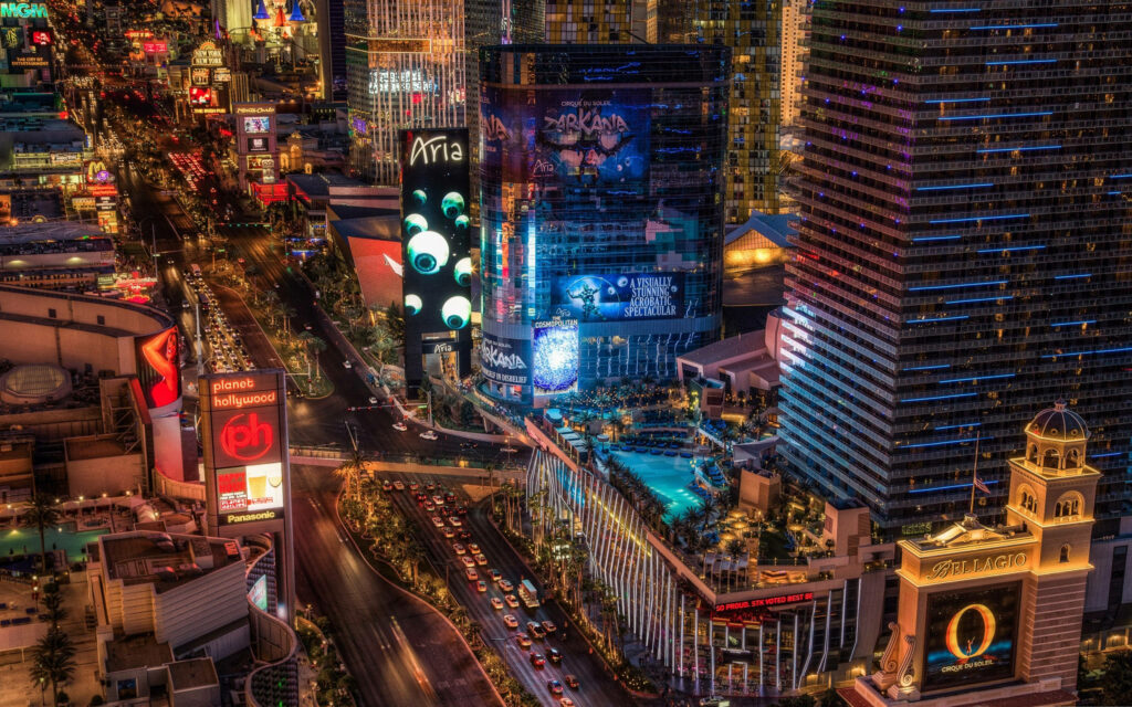 Vibrant Las Vegas Nightlife Wallpaper: Illuminated Iconic Hotspots
