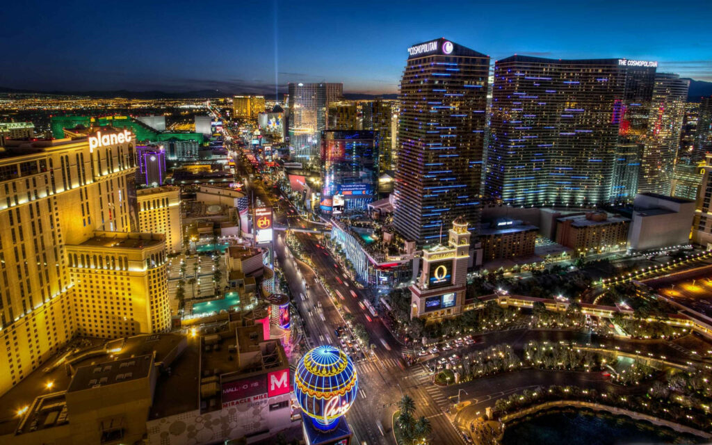 Vibrant Night View of Las Vegas Strip with The Cosmopolitan - Wallpaper