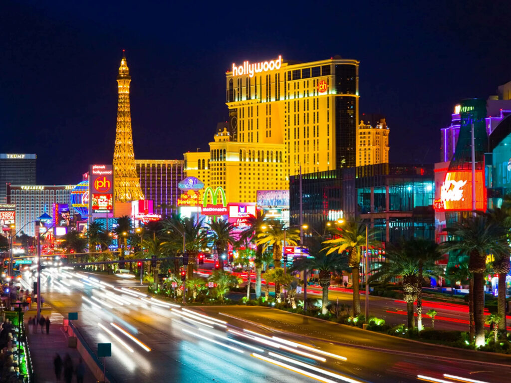 Illuminated Las Vegas Strip Wallpaper: Neon Lights & Iconic Landmarks