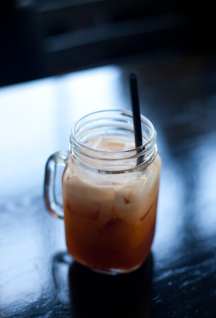 Vibrant Iced Drink in Jar: Colorful Refreshment Wallpaper