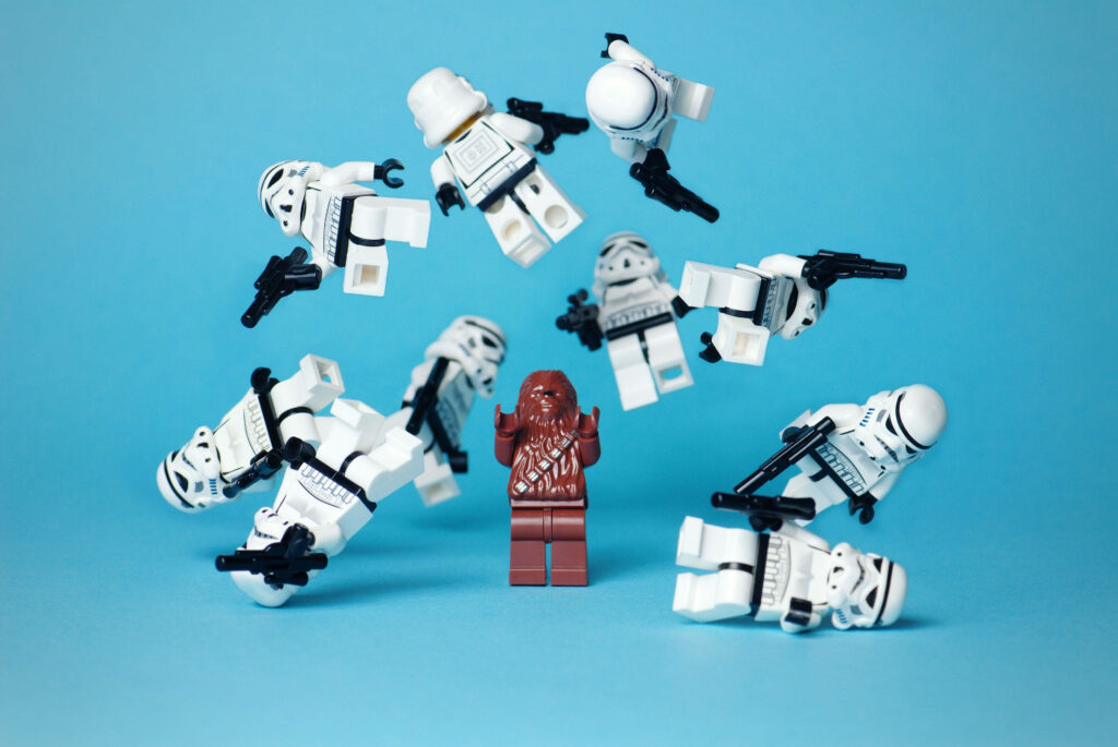 Vibrant Lego Star Wars Wallpaper: Chewbacca vs Stormtroopers Action
