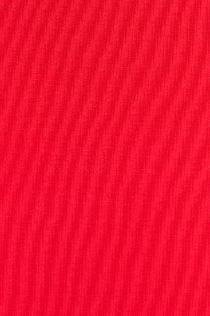 Vibrant light red minimalist wallpaper with subtle texture and bold saturated tone for desktops