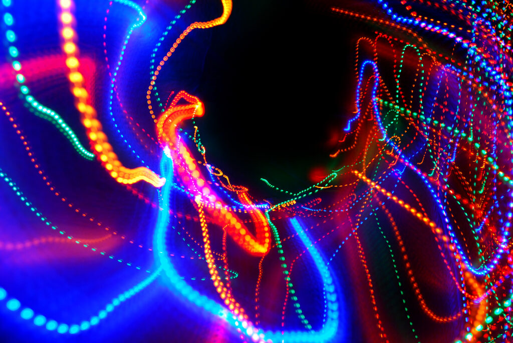 Vibrant Light Trail Wallpaper: Colorful Long Exposure Design
