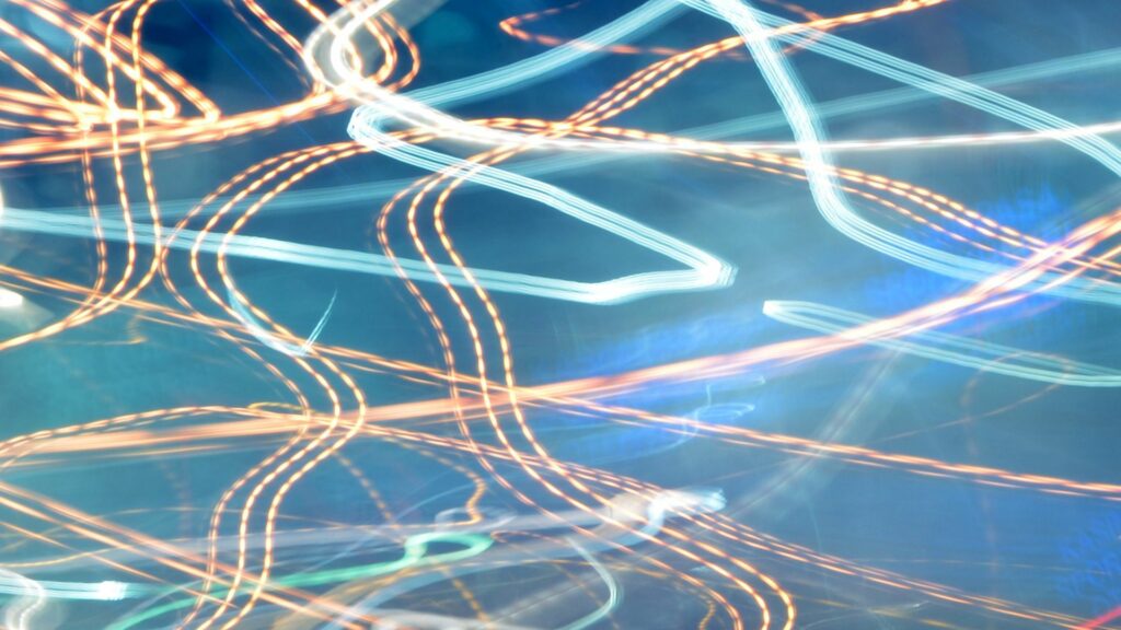 Vibrant Light Trails Wallpaper | Dynamic 1920x1080 Blue Background