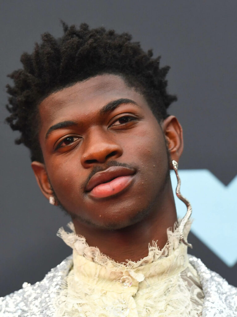 Vibrant Lil Nas X Portrait Wallpaper: Confident Style & Intricate Detail