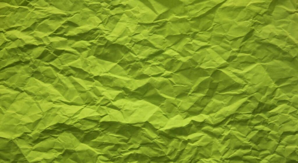 Dynamic Lime Green Crumpled Paper Wallpaper Background