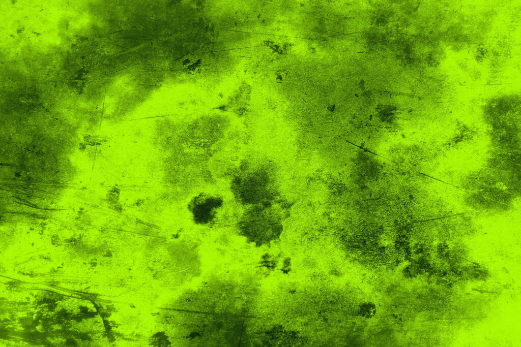 Vibrant Lime Green Grunge Textured Wallpaper Background Design