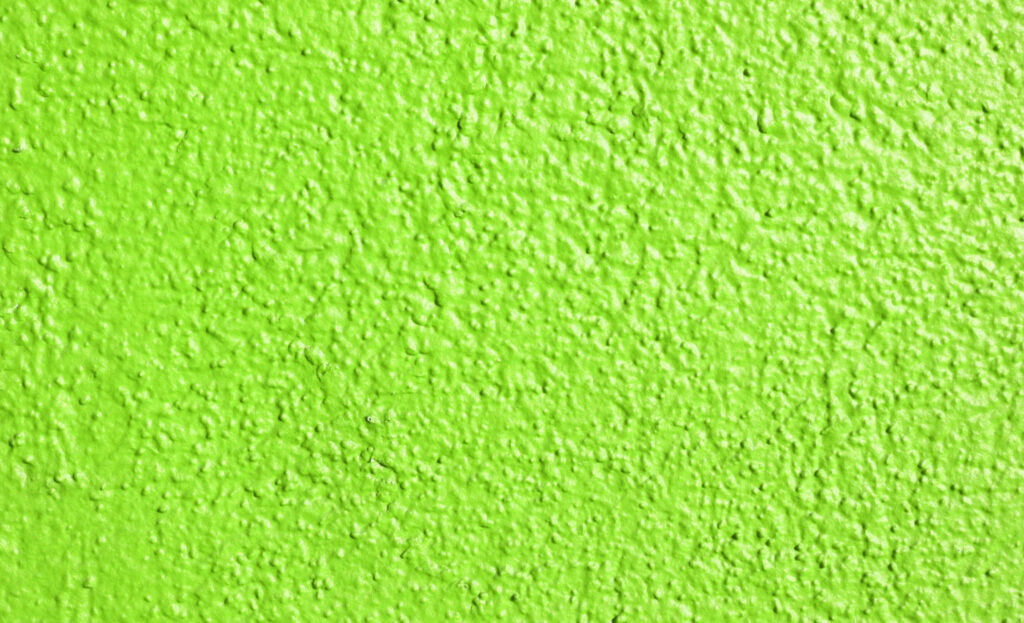 Vibrant Lime Green Textured Wallpaper: Rough, Uneven Surface Design