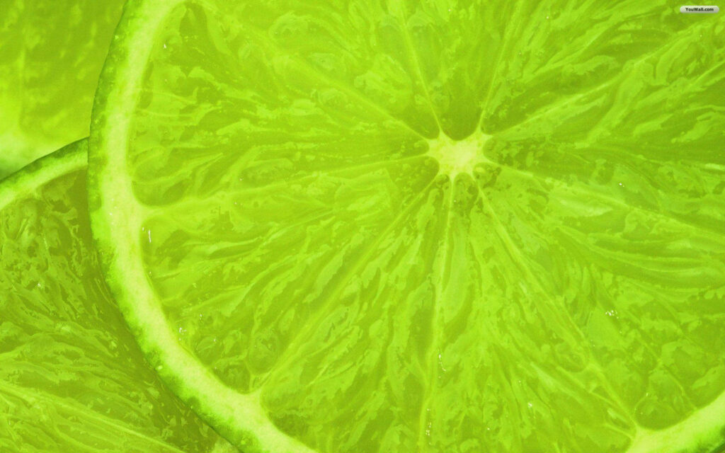 Vibrant Lime Slice Wallpaper: Close-Up of Yellow-Green Textures