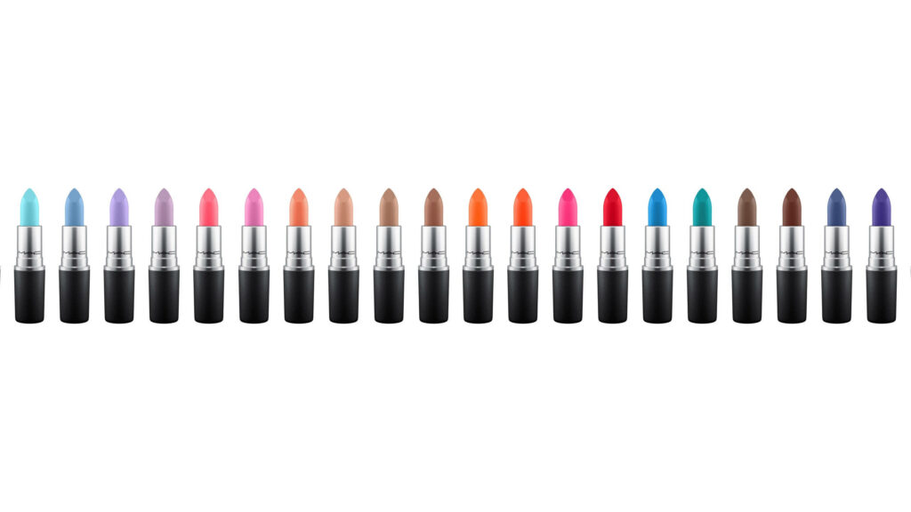 Vibrant lipstick tubes in bold and pastel colors on white background modern cosmetics wallpaper