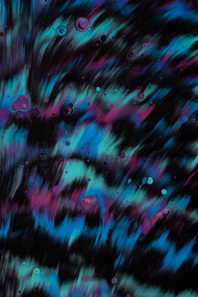 Vibrant Liquid Paint Wallpaper: Swirls of Blue, Purple, and Teal