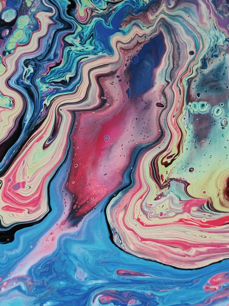 Vibrant Abstract Wallpaper: Colorful Liquid Paint Swirl Background