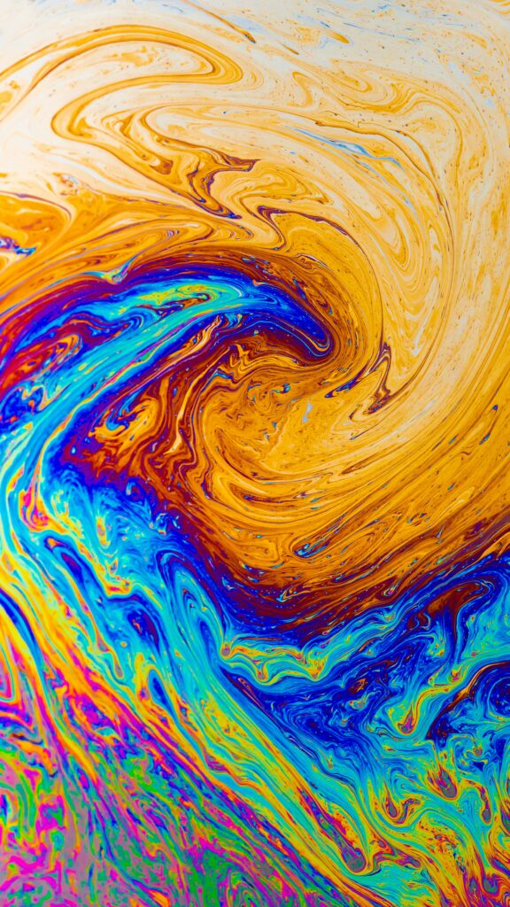 Vibrant Swirl Wallpaper: Dynamic Liquid Paint in Bright Colors