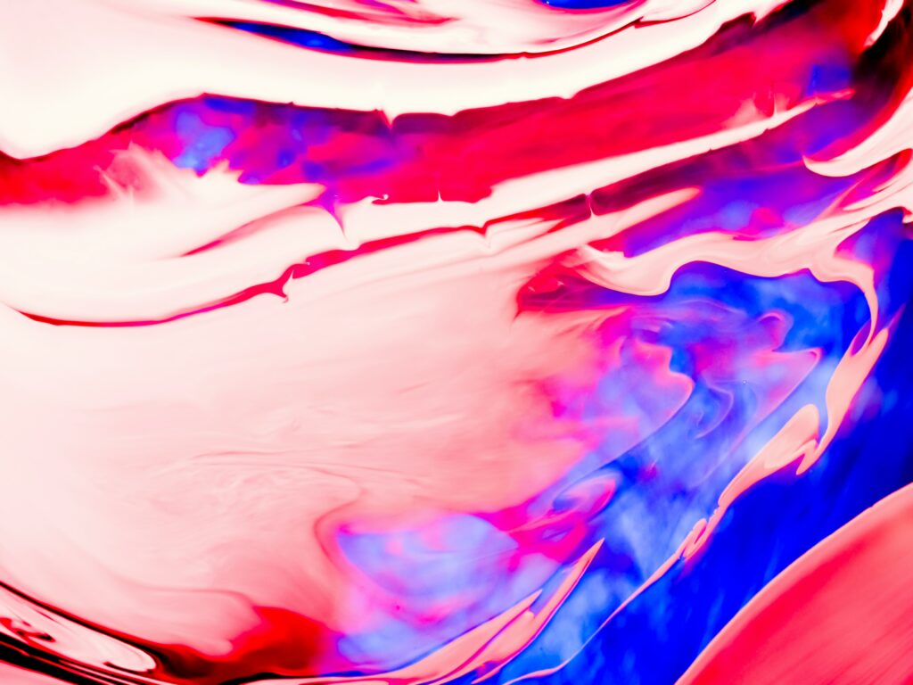 Vibrant Liquid Paint Wallpaper - Colorful Swirling Patterns Background