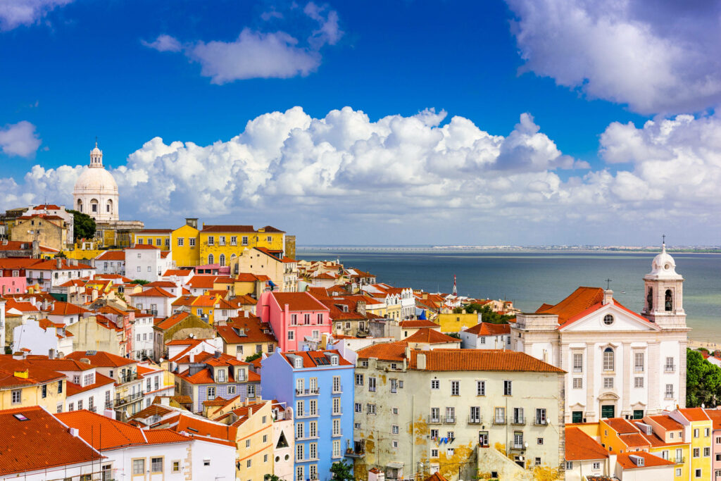 Vibrant Lisbon Wallpaper: Iconic Rooftops & Scenic River View