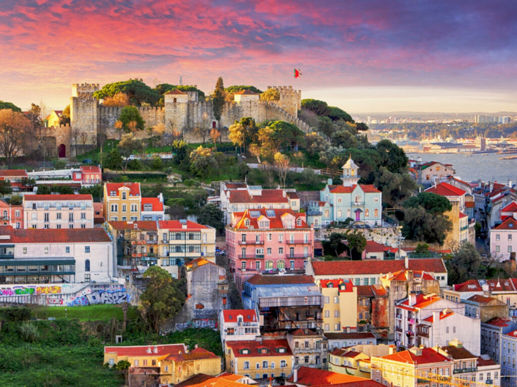 Scenic Lisbon Wallpaper: Colorful Architecture & Sunset Sky Beauty