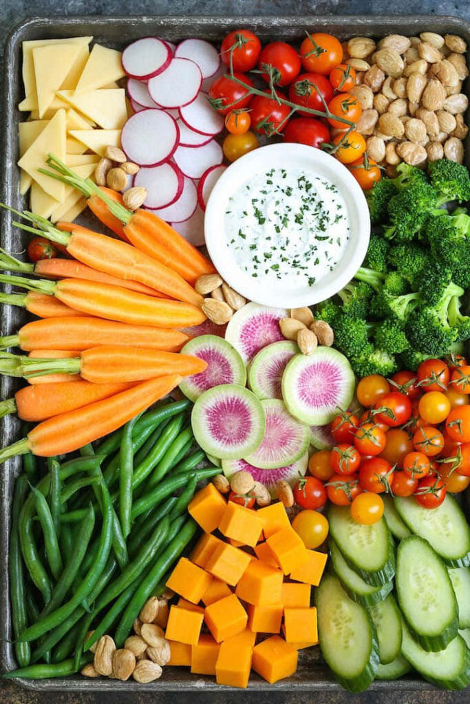 Vibrant Wallpaper of Colorful Fresh Local Foods & Dip Display