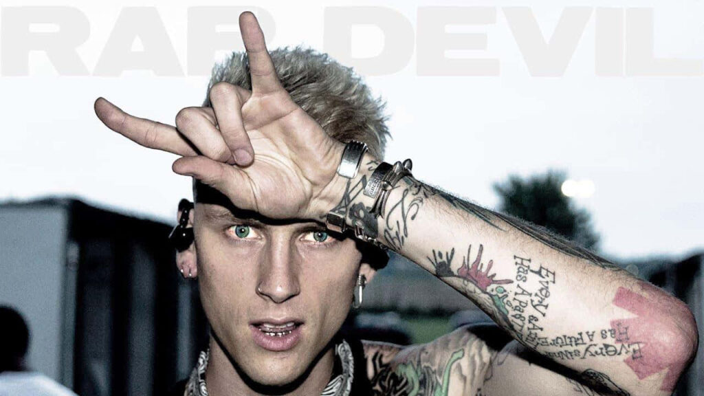 Vibrant MGK Wallpaper: Bold ‘I Love You’ Gesture & Intricate Tattoos