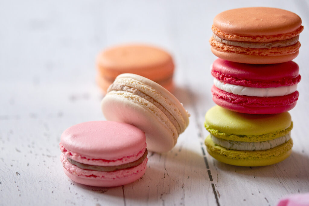 Colorful Macarons Wallpaper: Vibrant Sweet Dessert Background
