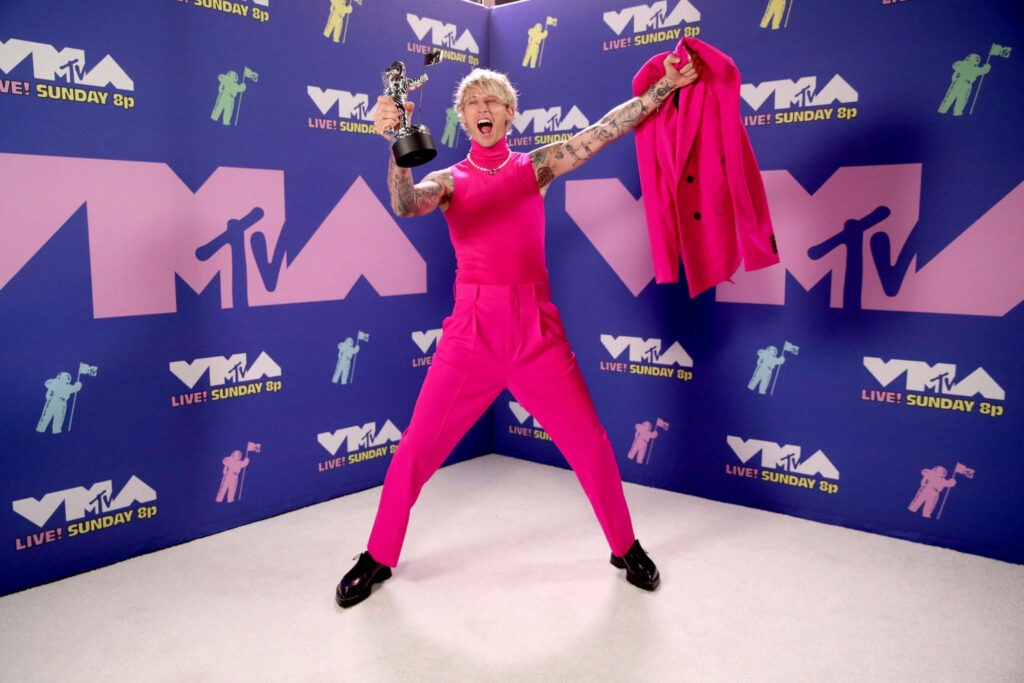 MTV Award Win: Machine Gun Kelly in Vibrant Pink - Wallpaper Background
