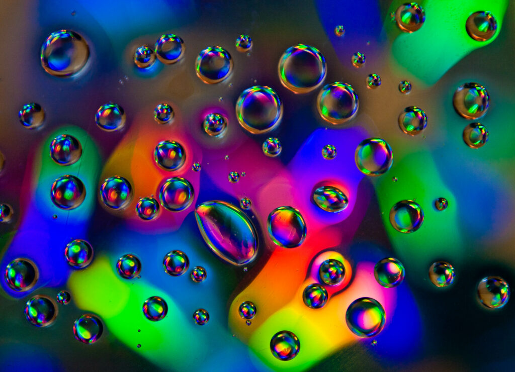Vibrant Macro Bubbles Wallpaper: Colorful Liquid Drops & Reflections
