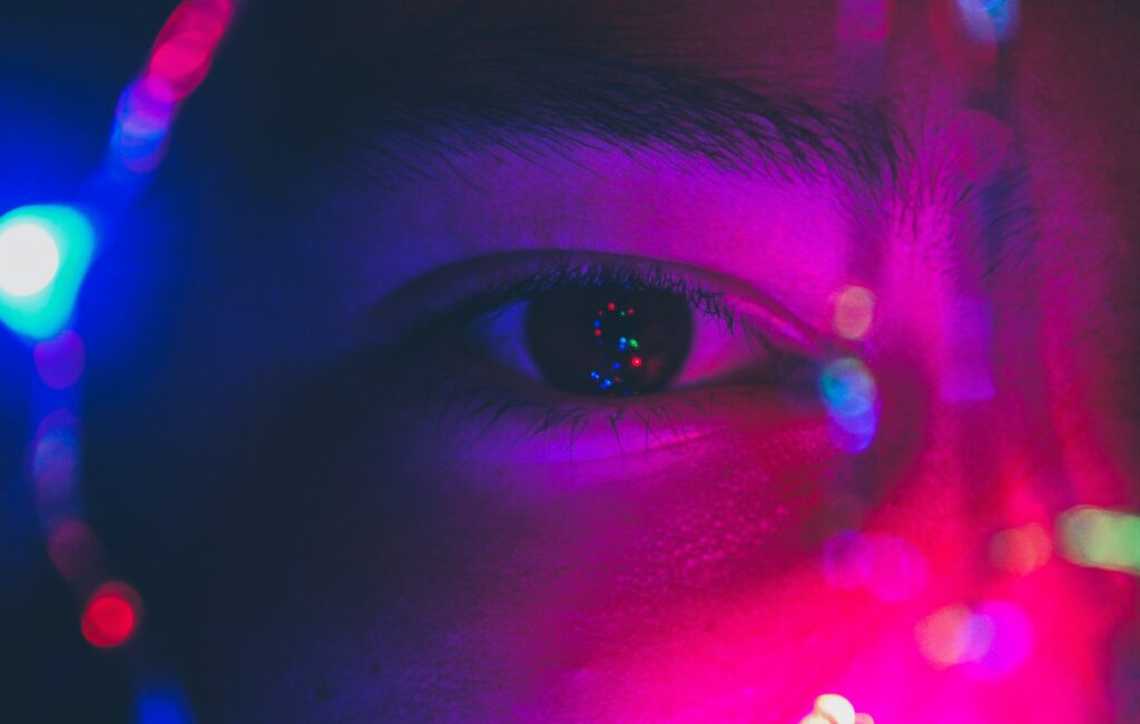 Vibrant Eye Macro Shot: Colorful Reflections Wallpaper Background