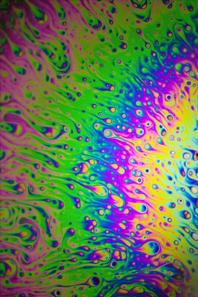 Colorful Macro Liquid Patterns Wallpaper | Vibrant Iridescent Background