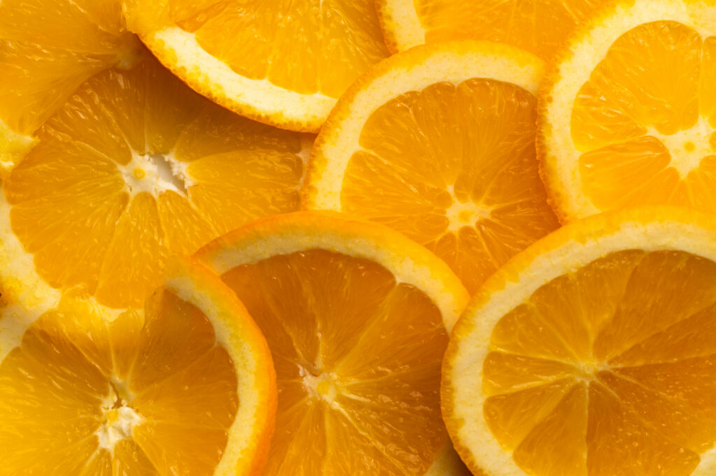Vibrant Citrus Wallpaper: Macro Shot of Juicy Orange Slices