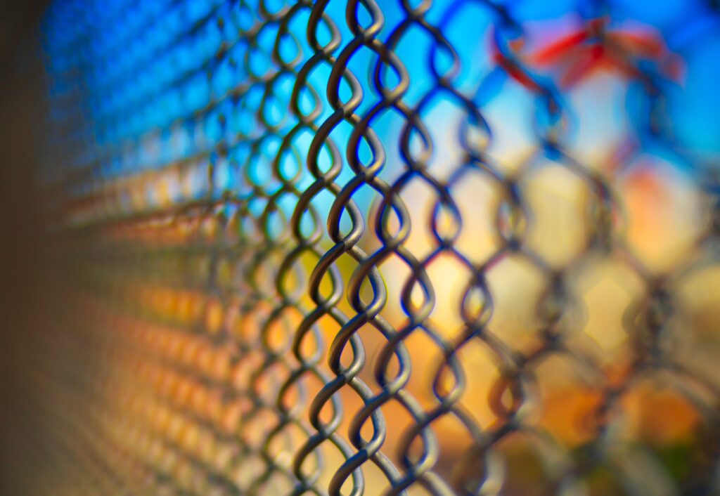 Vibrant Macro of Metal Chain-Link Fence - Colorful Wallpaper Background