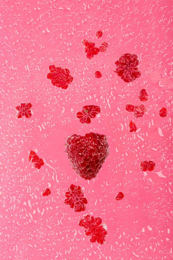 Vibrant Raspberry Macro Wallpaper with Water Drops - Pink Background
