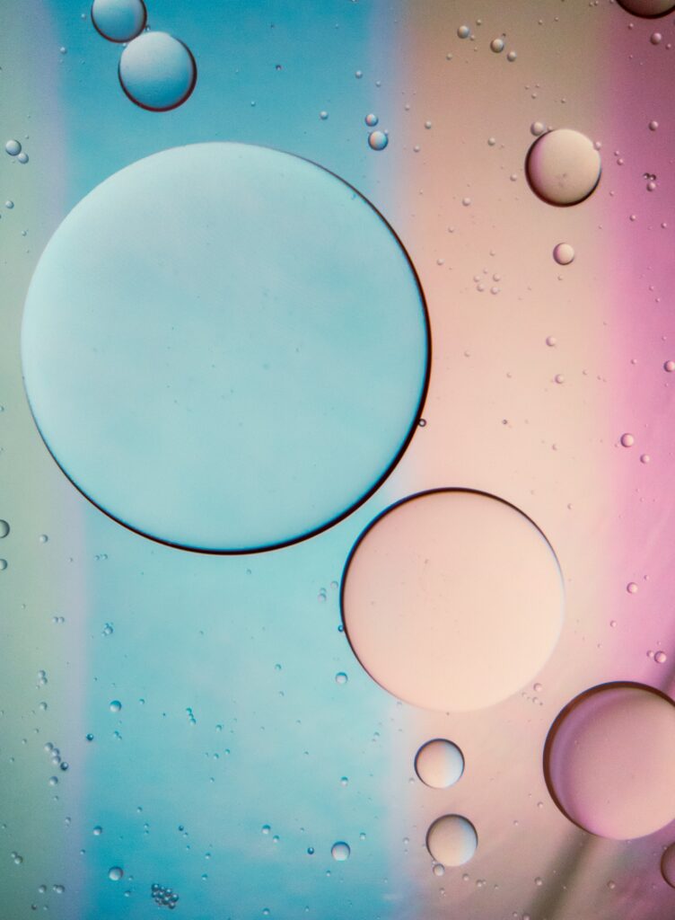 Vibrant Macro Wallpaper: Oil Bubbles in Soft Blue & Pink Abstract