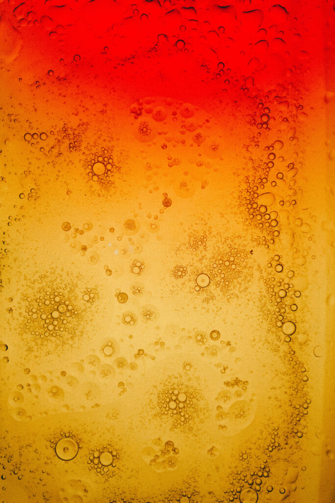 Vibrant Macro Wallpaper: Mesmerizing Yellow & Red Bubble Design