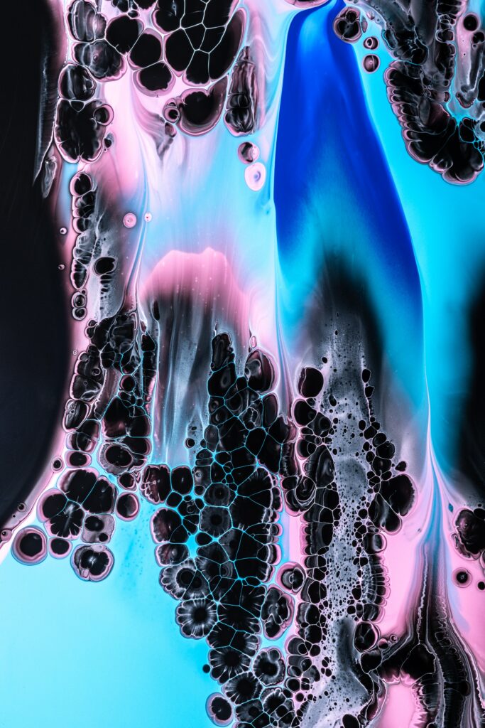 Vibrant Liquid Paint Macro Wallpaper: Abstract Blue, Pink, Black Design