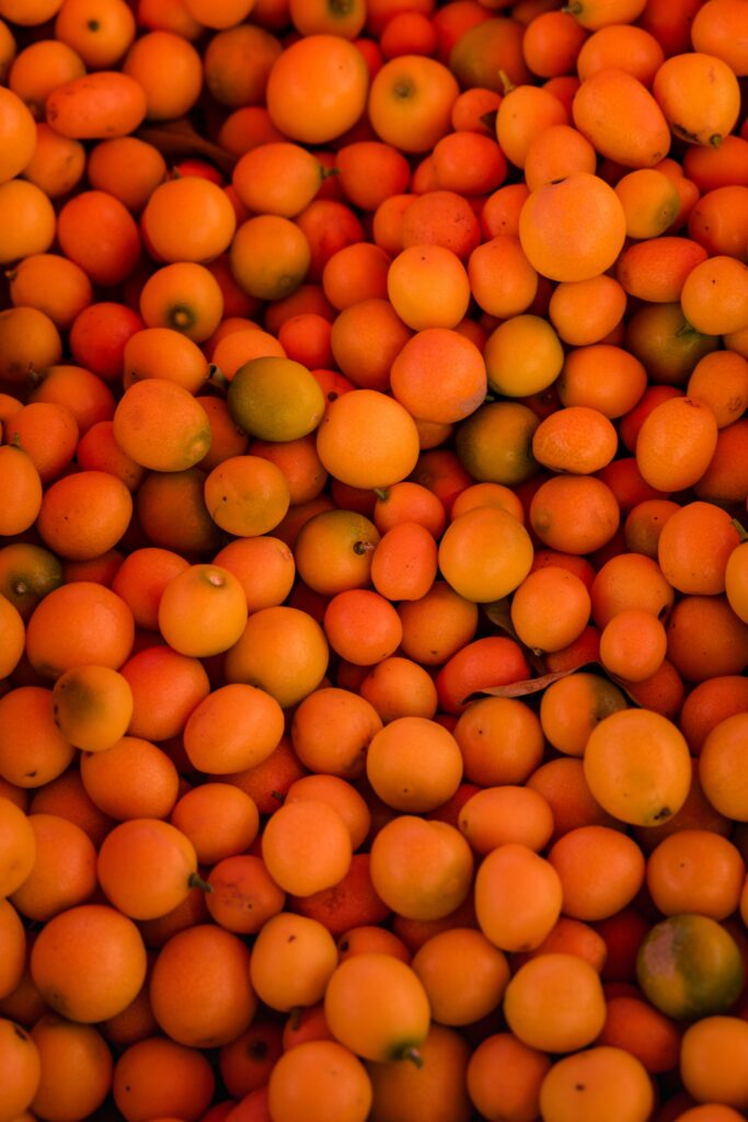 Vibrant Mango Wallpaper: Close-Up of Ripe Yellow-Orange Fruit