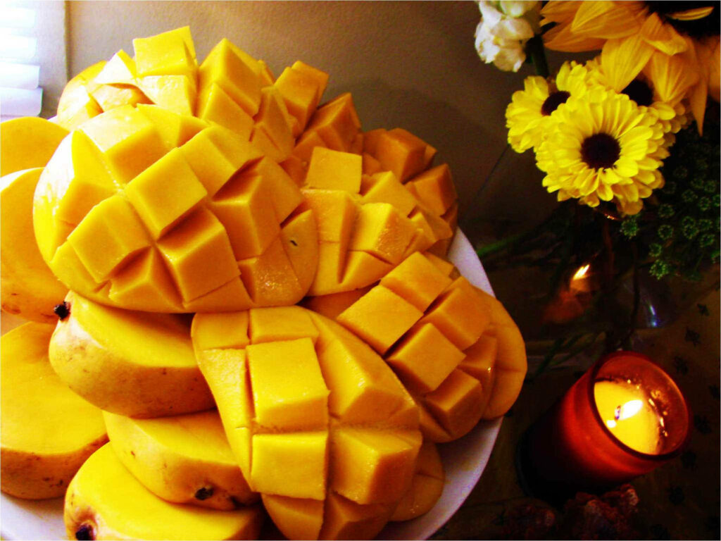 Vibrant Mango Wallpaper: Fresh Cubes, Flowers & Candle Ambiance
