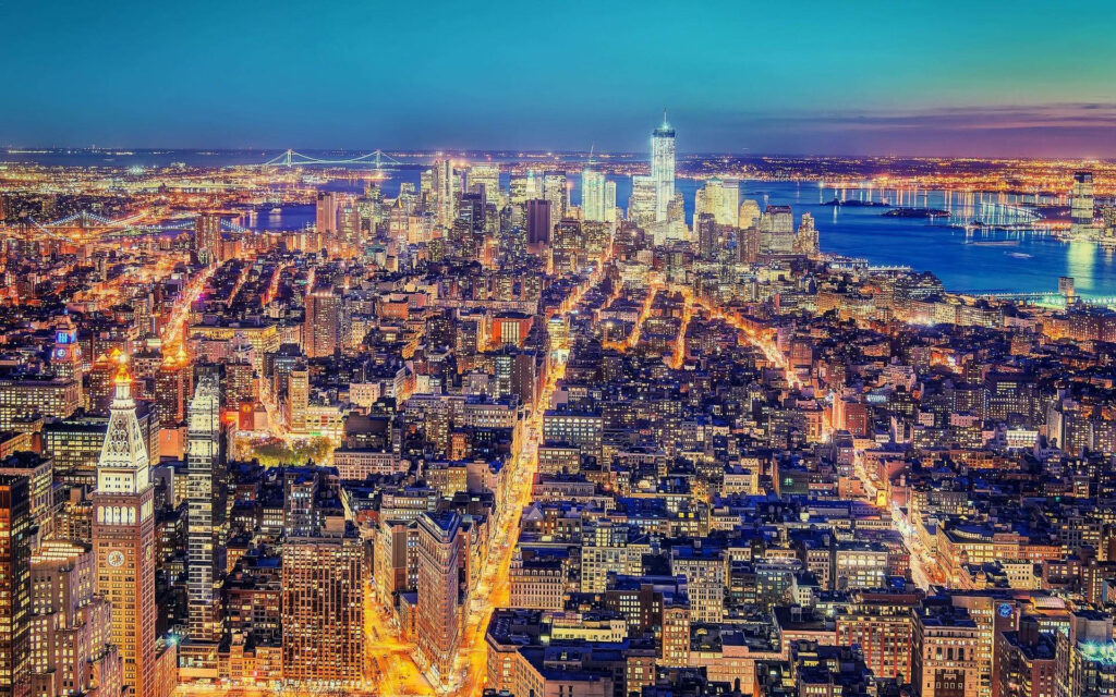 Vibrant Manhattan Night Skyline Wallpaper: City Lights & Bridges
