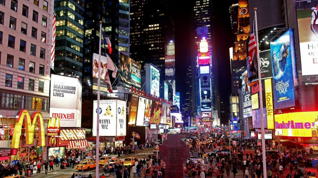 Vibrant Manhattan Night Wallpaper: Times Square's Neon Lights & Energy