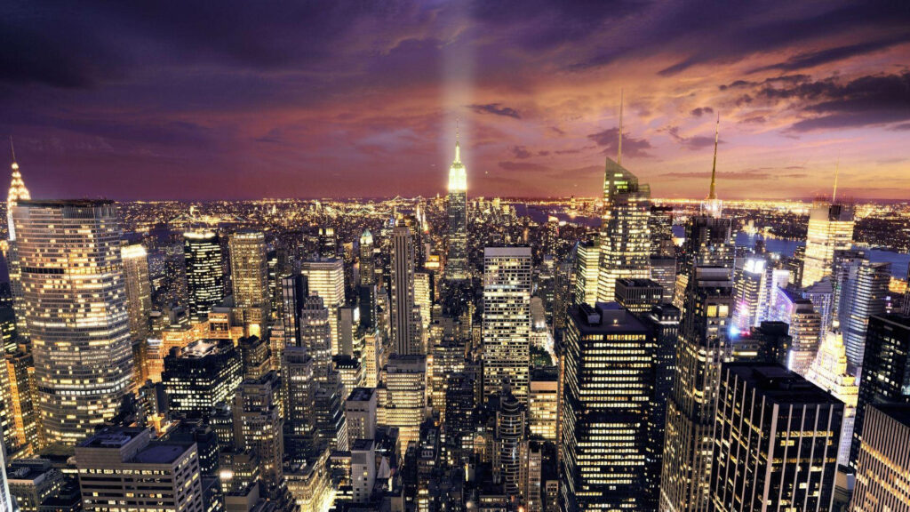 Vibrant Manhattan Skyline Wallpaper: Evening Sky & Iconic Architecture