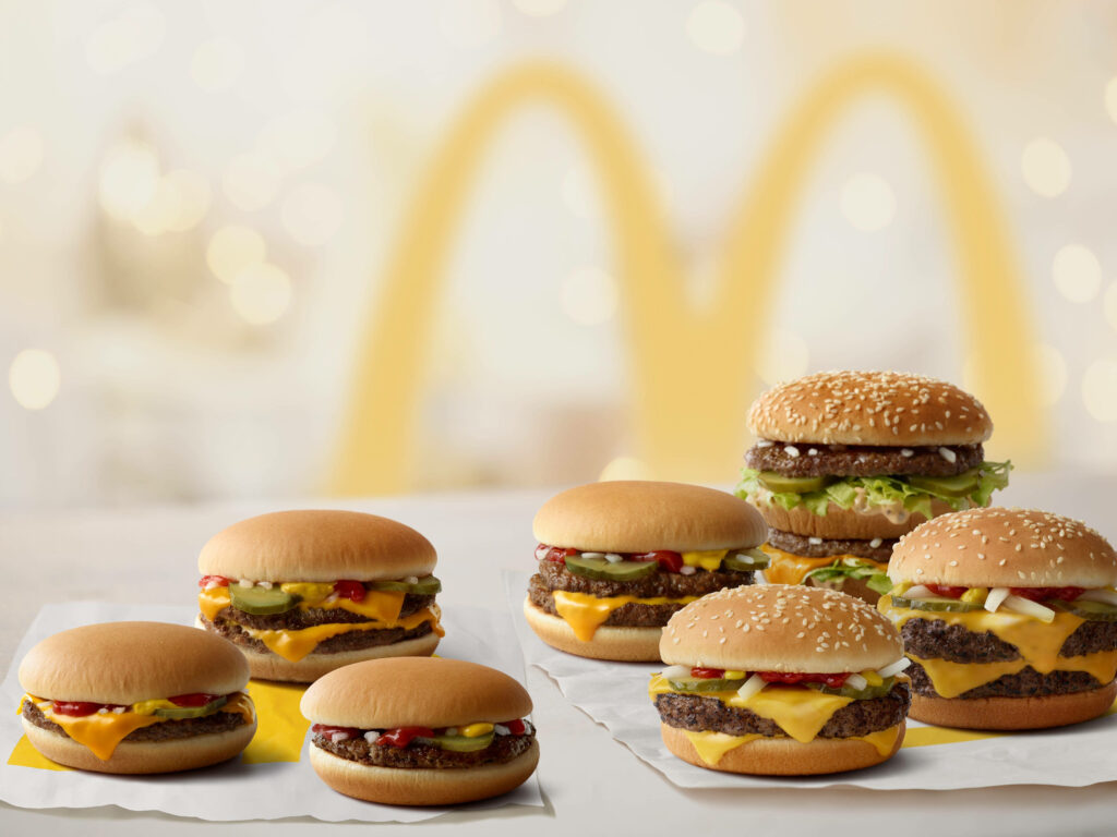 Vibrant McDonald's Cheeseburger Wallpaper with Golden Arches