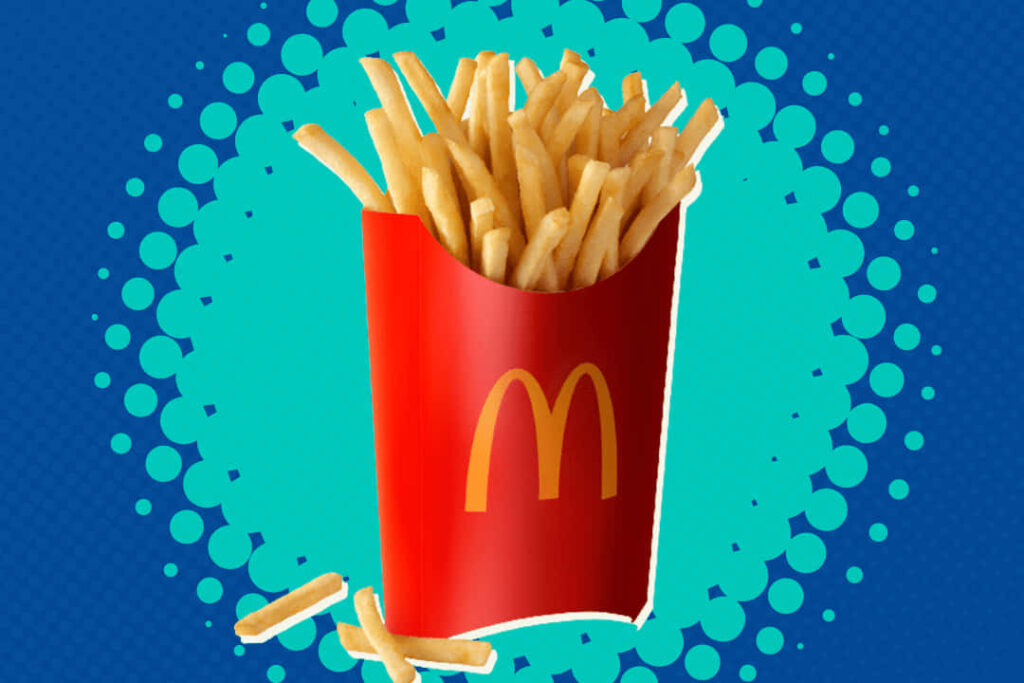 Vibrant McDonald's French Fries Wallpaper on Playful Blue Background