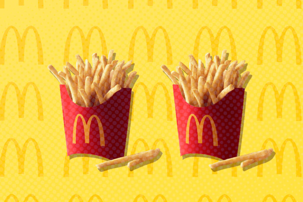Vibrant McDonald's Fry Box Wallpaper with Iconic Yellow Background