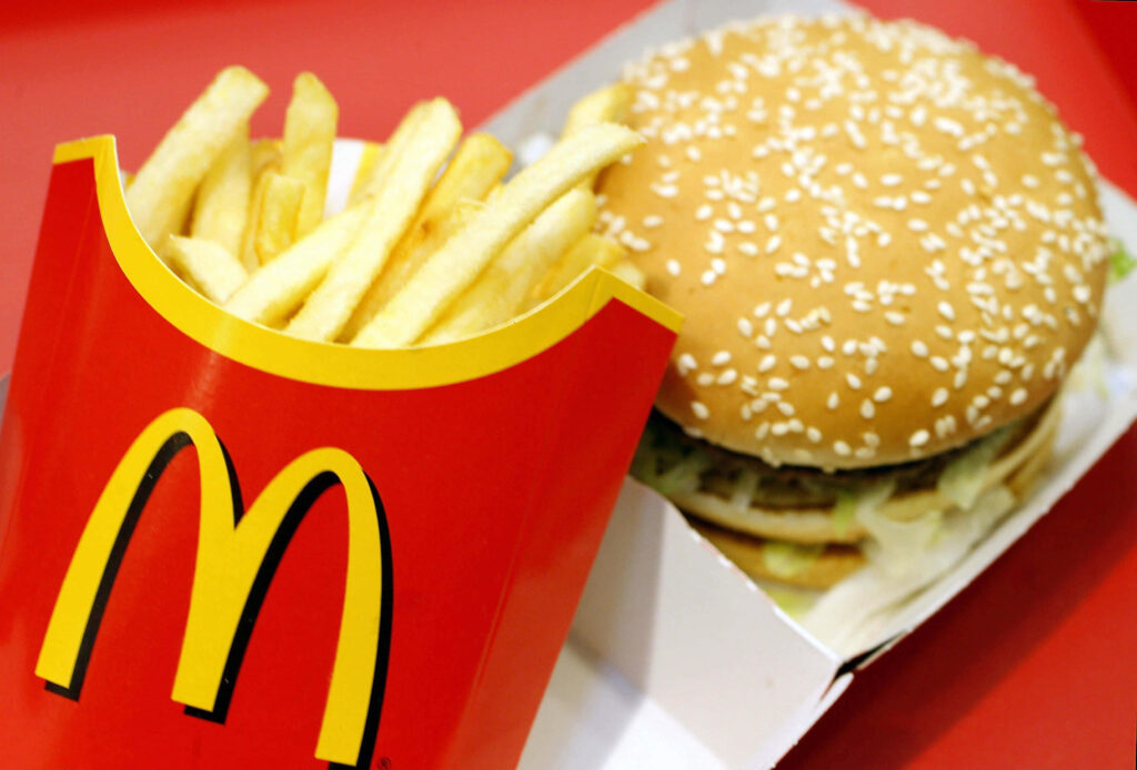 Vibrant McDonald's Hamburger & Fries Wallpaper on Red Background