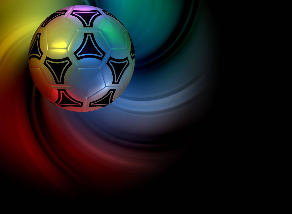 Metallic geometric soccer ball floating on dark background with vibrant swirling light trails Wallpaper