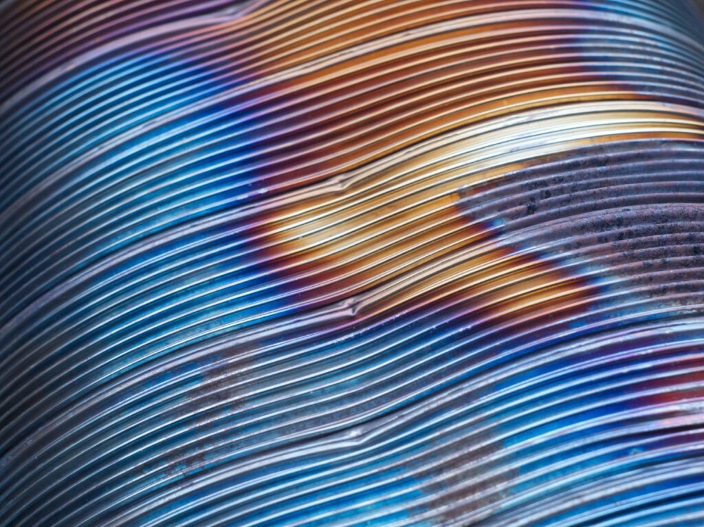 Vibrant Metallic Abstract Wallpaper with Colorful Textures