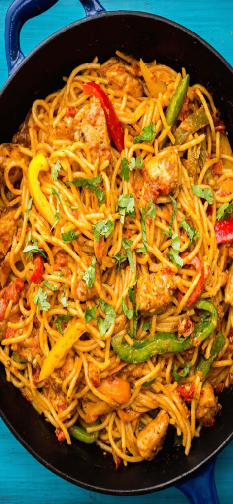 Vibrant Mexican Chicken Pasta Wallpaper: Colorful Skillet Delight